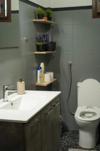 A bathroom at Arados family Residence