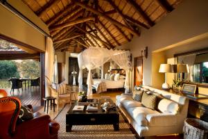 A seating area at Lion Sands - Tinga Lodge