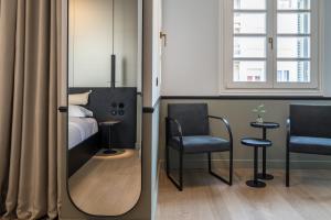 Posteľ alebo postele v izbe v ubytovaní 72 AD Suites
