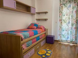 Postel nebo postele na pokoji v ubytování Piso familiar amplio con acceso directo a la playa