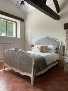 Posteľ alebo postele v izbe v ubytovaní Petit Murier
