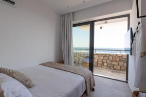 Postel nebo postele na pokoji v ubytování Villa Auretta