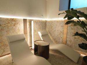 A seating area at STRAF, Milan, a Member of Design Hotels