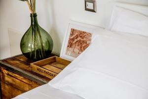 Llit o llits en una habitació de Oliveto Bed and Breakfast