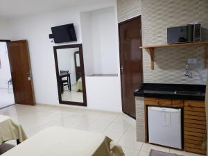 Η κουζίνα ή μικρή κουζίνα στο Estudio Recanto do Teimoso