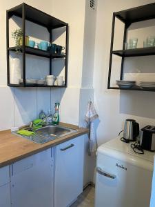 Kuchyň nebo kuchyňský kout v ubytování 40L Luisenstr 5.OG