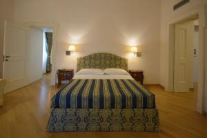 Postel nebo postele na pokoji v ubytování Domus Stella Maris - Casa per Ferie