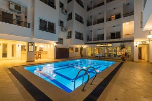 a swimming pool in the middle of a building at Swiss Wellness Dive Resort in Hurghada