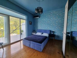 Cama o camas de una habitación en Calypso Kvariati Hotel