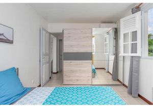 Voodi või voodid majutusasutuse Anthurium, Superbe haut de villa F3 proche plage, Anse Mitan toas