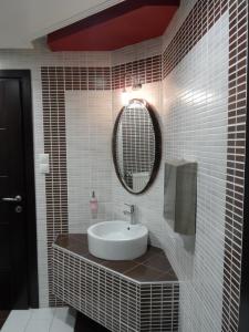 Salle de bains dans l'établissement Hotel Prigipikon Suites and sofites