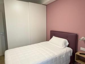 YOUMAMI Suite Hotel Wellness&Spa客房内的一张或多张床位