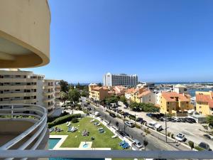 a view of a city from a balcony at Marina Mar II - Sea view by HD PROPERTIES in Vilamoura