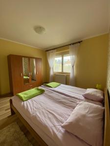 Voodi või voodid majutusasutuse Apartment Zabljak Center toas +33 fotot