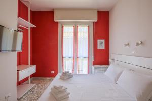 Posteľ alebo postele v izbe v ubytovaní The Red Loft in Ponte Vecchio n.2