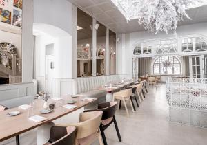 Reštaurácia alebo iné gastronomické zariadenie v ubytovaní Nosalowy Park Hotel & Spa