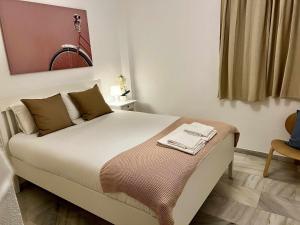 Posteľ alebo postele v izbe v ubytovaní Apartamento catedral A