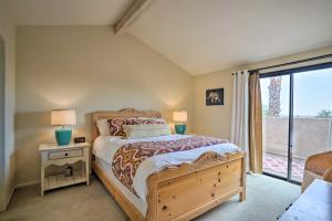 a bedroom with a large bed and a window at Borrego Springs Retreat with Grill and Patio! in Borrego Springs