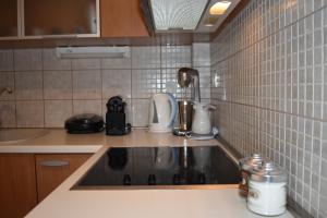 A kitchen or kitchenette at Angelina's Lovely Home