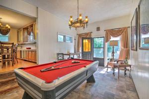 a living room with a pool table in it at Bright Springfield Home Walk to Nature Center! in Springfield