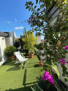 A garden outside Giresio 41 - Your Penthouse with Rooftop Garden in Milano Navigli - WIFI