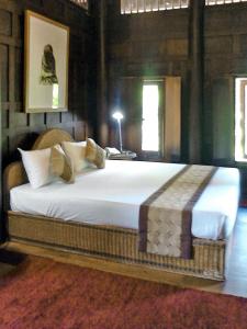 Un ou plusieurs lits dans un hébergement de l'établissement Mekong Villas