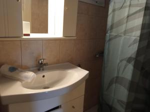 Kúpeľňa v ubytovaní Private two-floor holiday house in Leptokaria + 37 fotografií