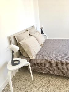 Postel nebo postele na pokoji v ubytování Dans une maison, appartement indépendant et jardin