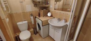 Kúpeľňa v ubytovaní Retrospekcja - Apartament w centrum