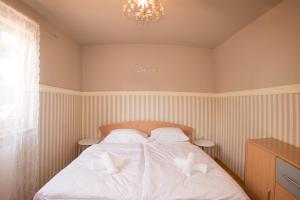 Posteľ alebo postele v izbe v ubytovaní Apartment ELLY