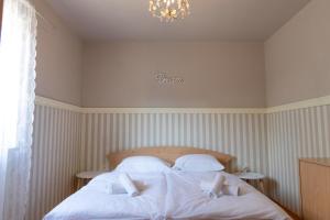 Posteľ alebo postele v izbe v ubytovaní Apartment ELLY