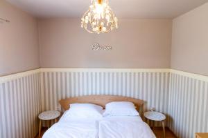 Posteľ alebo postele v izbe v ubytovaní Apartment ELLY