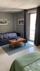 Ένα ή περισσότερα κρεβάτια σε δωμάτιο στο APARTAMENTO FONTE DO CRISTO