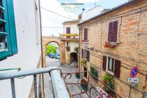 a view of an alley from a balcony of a building at Casa Vacanze Licinia - Appartamento centro storico in Citta' Sant'Angelo