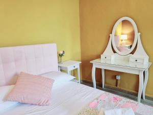 Postel nebo postele na pokoji v ubytování Rose Guest House