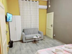 TV a/nebo společenská místnost v ubytování Rose Guest House