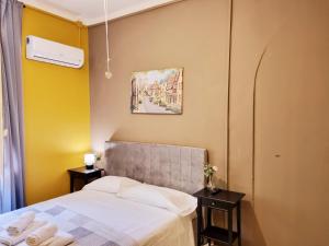 Postel nebo postele na pokoji v ubytování Rose Guest House
