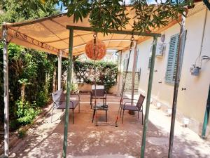 Patio nebo venkovní prostory v ubytování Rose Guest House