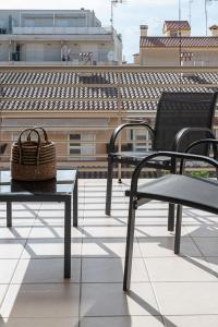 A balcony or terrace at Nuevo apartamento en playa con aire acondicionado MASBO 3