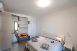 A bed or beds in a room at Dream Baveno