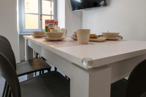 A television and/or entertainment centre at Dream Baveno