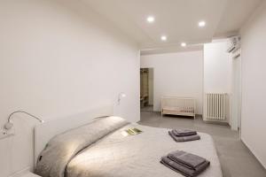 A bed or beds in a room at Dream Baveno