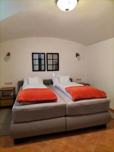 Postel nebo postele na pokoji v ubytování Sakura Apartment