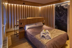 Postel nebo postele na pokoji v ubytování HOTEL LA CABANA BERGA