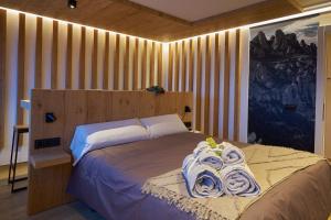 Postel nebo postele na pokoji v ubytování HOTEL LA CABANA BERGA