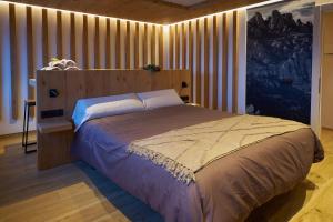 Postel nebo postele na pokoji v ubytování HOTEL LA CABANA BERGA