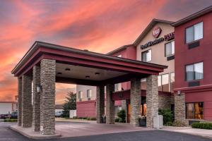 a rendering of a hotel with a sunset at Best Western Plus Chelsea Hotel in Monticello