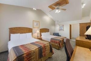 Ένα ή περισσότερα κρεβάτια σε δωμάτιο στο Best Western Kokopelli Lodge +22 φωτογραφίες
