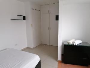 Postel nebo postele na pokoji v ubytování Apart Peru II