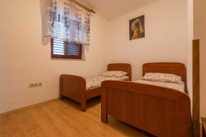 Postel nebo postele na pokoji v ubytování Apartments with a parking space Crikvenica - 5493